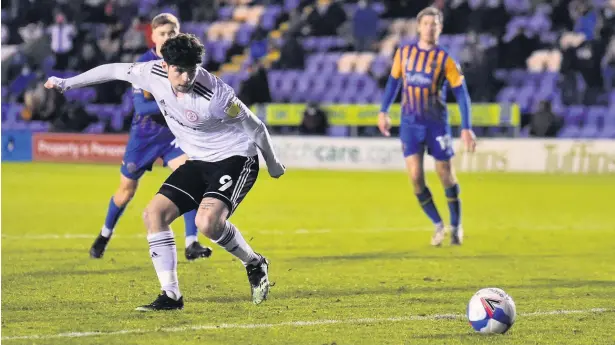  ?? Nathan Stirk ?? Ryan Cassidy scores Stanley’s second goal in the 2-2 draw against Shrewsbury Town