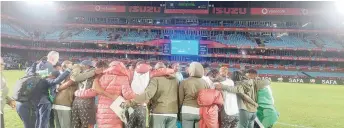  ?? ?? The Nigerian contingent celebratin­g Super Falcons' qualificat­ion for Paris 2024 Olympics after their goalless draw with the Banyana Banyana in Pretoria, South Africa... yesterday.