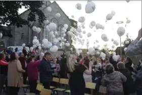  ??  ?? Balloons being relased at latst years event in Charlevill­e remebering and celebratin­g the lives of those who have died by suicide.