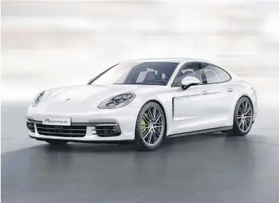  ??  ?? The Panamera’s 4.0-litre turbocharg­ed V-8 engine and 100-kW electric motor, working together, put power to all four wheels and produce 680 horsepower and 626 pound-feet of torque.