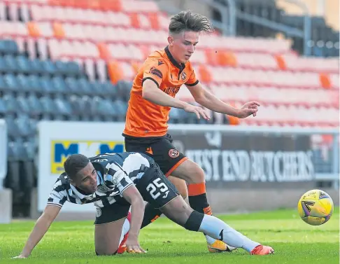  ??  ?? DETERMINED: Dundee United winger Logan Chalmers up against Ethan Erhahon of St Mirren at Tannadice.