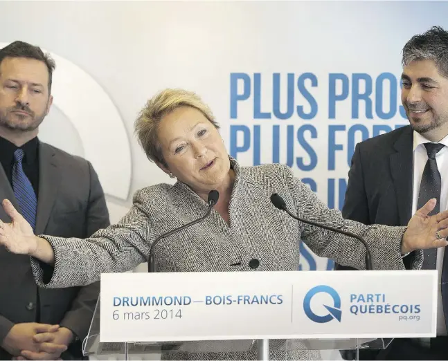  ?? Ryan Remiorz / The Cana dian Pres ?? Parti Québécois leader Pauline Marois speaks during a news conference in Drummondvi­lle, Que., on March 4. Quebecers will vote in a provincial election April 7.