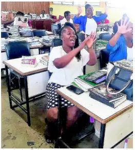  ?? PHOTOS BY CECELIA CAMPBELL-LIVINGSTON ?? Central High staff celebrates the school chairman’s resignatio­n yesterday.