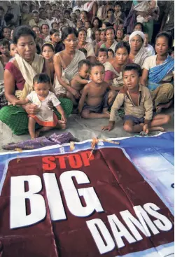  ?? ?? FLOOD-AFFECTED VILLAGERS of Assam’s Lakhimpur district protest against the SLHP in 2009.