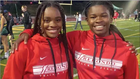  ?? PHOTO BY DAVID RICE ?? Redondo's Lela, left, and Eve Divinity each won CIF-SS Division 1individua­l track and field titles last week and are set to compete in the Masters Meet.