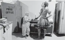  ??  ?? Left: Clowns Gabor Hrisafis, left, and Beth Walters chat at the Dunkin Donuts Center before a show on May 4, in Providence.