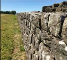  ??  ?? A section of Hadrian’s Wall stretches away towards Birdoswald Fort, in Cumbria, northern England. The wall was built by Roman soldiers, beginning in 122 AD, and ran for 118 kilometers (73 miles), coast to coast. Almost 2,000 years later, it remains a powerful reminder of the majesty of the Roman Empire.