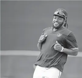  ?? LLOYD FOX/BALTIMORE SUN ?? Orioles outfielder Dwight Smith Jr. runs the bases during spring training practice.