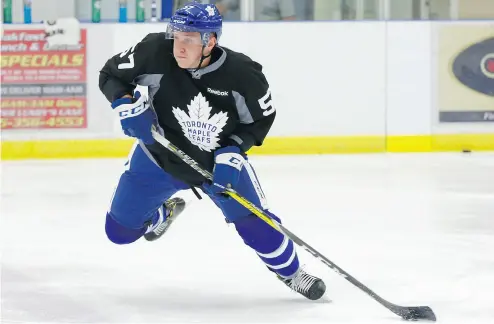  ?? JACK BOLAND / POSTMEDIA FILES ?? Travis Dermott, seen here at last year’s camp, is trying to land the sixth spot on the Leafs’ defence depth chart.
