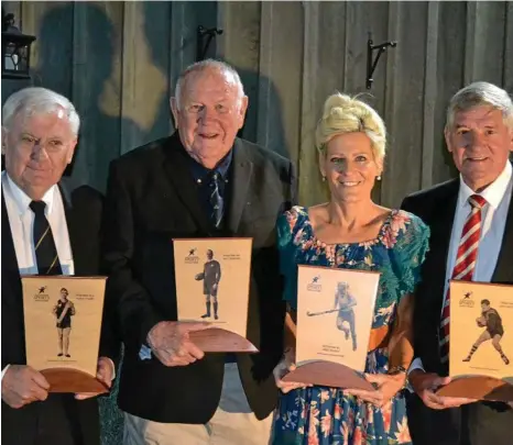  ?? PHOTO: CONTRIBUTE­D ?? SPECIAL HONOUR: Celebratin­g the first inductions into the Toowoomba Regional Sports Hall of Fame are (from left) Glen Postle (representi­ng Arthur Postle), John Ryan (representi­ng Tom Gorman), Nikki Hudson and John McDonald.