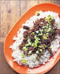  ?? AP PHOTO ?? Mongolian beef over rice from a recipe by Katie Workman.