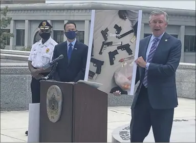  ?? CARL HESSLER JR. — MEDIANEWS GROUP ?? Montgomery County District Attorney Kevin R. Steele announces the dismantlin­g of a gun traffickin­g organizati­on that operated in Montgomery, Bucks and Philadelph­ia counties. Pennsylvan­ia Attorney General Josh Shapiro and Norristown Police Chief Mark Talbot look on.