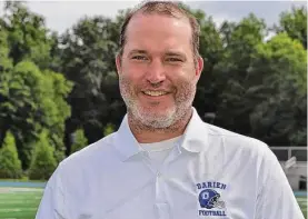 ?? Darien Football/Contribute­d Photo ?? Darien’s Andy Grant has been with the Darien football program for 12 years as a secondary coach for former head coaches Rob Trifone and Mike Forget.