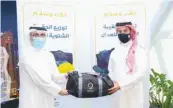  ??  ?? The in-kind donations, which come as part of QFA’s social responsibi­lity, included sports equipment and clothes of various sizes.