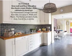  ??  ?? KITCHEN Grey wall and floor tiles allow the classic cream Shaker-style cabinets to stand out. Try Homestead Cottage Charcoal floor tiles, £12.95sq m, Walls and Floors. The Rattan pendant shade, £125, Cox & Cox, is similar