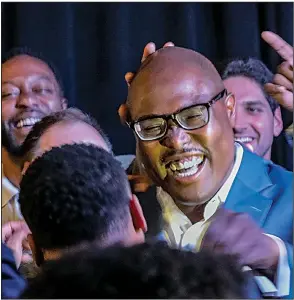  ?? Arkansas Democrat-Gazette/JOHN SYKES JR. ?? Frank Scott Jr. hugs family and friends at his watch party Tuesday night at Cajun’s Wharf. “I thank you. For every text message and phone call, I thank you,” he told supporters. “And for the voters who did not vote for us, I want to earn your support.”