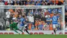  ?? Photograph: Lee Smith/Action Images/Reuters ?? James Tavernier slams in the penalty to start the Rangers fightback.
