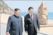  ?? AP ?? Kim Jong Un (left) and Xi Jinping in Dalian.