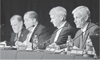  ?? LUIS SANCHEZ SATURNO, AP ?? Sean Sullivan, right, chairman of the Defense Nuclear Facilities Safety Board, has advocated shrinking or closing the safety board.