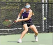  ?? AUSTIN HERTZOG - DIGITAL FIRST MEDIA ?? Phoenixvil­le’s Julia Gumieniak hits a backhand during the semifinals of the PAC singles tournament Friday.