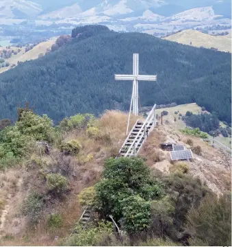  ??  ?? Below right: Tinui Cross on top of the hill.