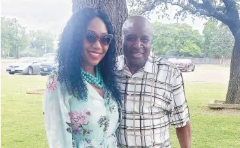  ?? CARLA GATES ?? Carla Gates stands with her husband, Eugene Gates Jr., a Dallas mail carrier who died June 20. The 66-year-old collapsed on a homeowner’s property when he was making deliveries on a suffocatin­g hot day, and he later died at a hospital.