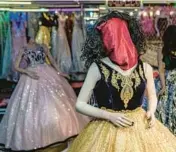  ?? EBRAHIM NOROOZI/AP ?? A female dress shop mannequin’s face is covered last month in Kabul, the capital of Afghanista­n.