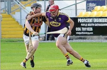  ??  ?? Wexford corner-back Garrett Foley bursting out of defence beyond Kilkenny’s Edmond Delaney.