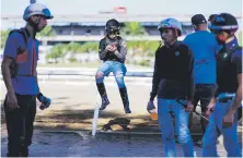  ?? Ramon.zayas@gfrmedia.com ?? CLASE APARTE Para el agente Mario “Tico” García, es un orgullo parala hípica boricua la cantidad de jinetes activos en el Kentucky Derby.