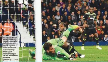  ??  ?? Chelsea’s striker Michy Batshuayi (right) scores the only goal in the match against West Bromwich Albion during the English Premier League at The Hawthorns stadium yesterday. –