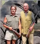  ??  ?? KILLER KING: Juan Carlos, right, poses in front of an elephant he shot