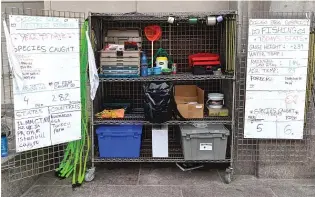  ?? DALE BOWMAN/SUN-TIMES ?? Plans call for a cabin of sorts for ‘‘Fishing at the Jetty’’ on the Chicago Riverwalk. That would be an upgrade from the working cart from last summer that included boards with updated fishing and water data.