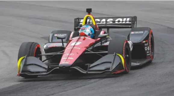  ?? CITIZEN NEWS SERVICE PHOTO BY TOM E. PUSKAR ?? Robert Wickens competes in the IndyCar Series auto race, Sunday, July 29, 2018, at Mid-Ohio Sports Car Course in Lexington, Ohio.