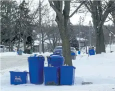  ?? JULIE JOCSAK/ STANDARD STAFF ?? Emterra says it is working hard to get all of the garbage and recycling picked up from St. Catharines homes.