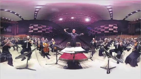  ?? Philharmon­ia Orchestra ?? ESA-PEKKA SALONEN, principal conductor and artistic advisor, leads the London-based Philharmon­ia Orchestra as part of a virtual reality experience.