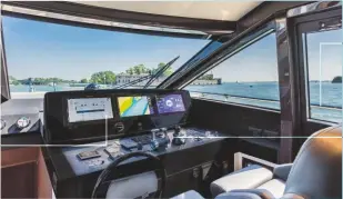  ??  ?? Ferretti’s boat management system runs everything from lights to pumps and the air-conditioni­ng units The throttles and joystick are an awkward stretch away when seated but fine for standing The side door provides ventilatio­n and allows the person at the helm to nip out on deck