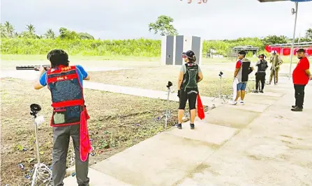  ?? PHOTOGRAPH COURTESY OF PnSA ?? OLYMPiAn Eric Ang (left) and other members of the national shotgun shooting team test the Magnus Front Sight Range.