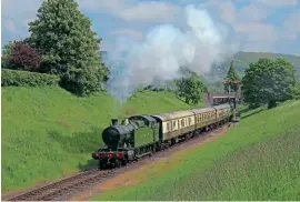  ??  ?? The Gloucester­shire Warwickshi­re Railway, which is preparing to celebrate its 40th anniversar­y with an April 13 reopening, has been given a further lifeline of £71,800 in the latest round of CRF grants. In charge of its first public trains will be GWR 2-8-0 No. 4270, heading trains of six carriages comprising five compartmen­t coaches. Each compartmen­t can accommodat­e up to six people in a social bubble, and there is one open coach with limited seating for couples and individual­s. During its anniversar­y, the line is planning a major exhibition and awards ceremony for the first volunteers from 1981 who are still with the railway. No. 4270, which was restored to action in 2014, is seen accelerati­ng away from Winchcombe on May 27, 2017. MALCOLM RANIERI