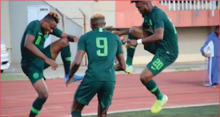  ??  ?? Super Eagles players celebratin­g a goal against Lesotho