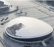  ?? PHOTOS BY REUTERS ?? In late July, the state-of-the-art velodrome with its wooden track caught fire and was heavily damaged.