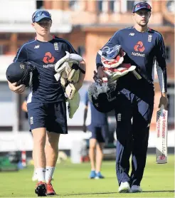  ??  ?? Ollie Pope and Joe Root arrive for a nets session at Lord’s