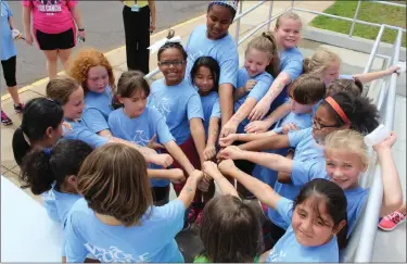  ?? MEDIANEWS GROUP FILE PHOTO ?? Franklin Elementary students participat­ing in the Girls on the Run program pose for a photo after their practice 5K in Pottstown. Summer camps programs are permitted in the yellow phase.
