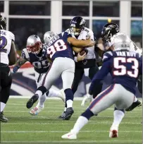  ?? Photo by Louriann Mardo-Zayat / lmzartwork­s.com ?? Trey Flowers (98), Kyle Van Noy (53) and the New England Patriots have allowed the fewest points in the NFL after giving up just three points in a win at Denver Sunday afternoon.
