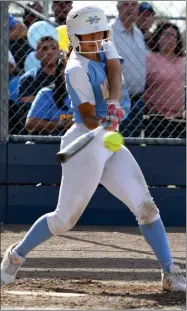  ?? PHOTO FOR THE RECORDER BY DONNIE ZIMMERMAN ?? Monache’s Jessica Batres gets a hit during Monache’s six-run fourth inning during Saturday’s game at MHS.