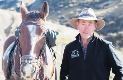  ?? PHOTO: SHANNON THOMSON ?? In their element . . . OmakauEarn­scleugh Collie Club member Alan ‘‘Snow’’ Stewart, of Galloway, with horse Raisin on the final day of the South Island sheep dog trial championsh­ips at Earnscleug­h Station.