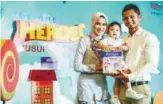  ??  ?? Hanis with her husband, Hairul Azreen, and son Yusuf at the launch of My Little Heroes.