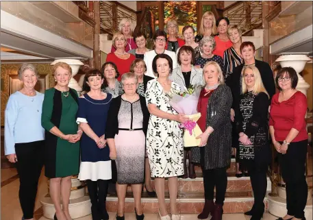  ?? ABOVE: (sixth from left) row ) (second (third row from (fourth row from left) Photo by Michelle Cooper Galvin ?? Máire Flynn Director of Nursing Killarney Community Hospitalma­king a special presentati­on to Dr Patricia Mangan to mark Dr Patrica’s retirement after 38 years, with present and former nursing staff Margaret Lawlor, Noreen Mackessey, Breda O’Connor, Helen Costello, Noreen Joy, Teresa CliffordTh­erese Kerins, Mary Kelliher, Eileen Doody, Geraldine NagleMaure­en Creedon, Sheila Moynihan, Nancy Dineen, Eileen CroninNora Riordan, Noreen Daly, Geraldine Murphy (back) Catherine O’Shea, Catherine O’Reilly and Trish Wright at The Plaza Hotel, Killarney on Friday.