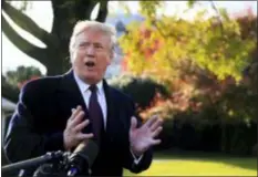 ?? MANUEL BALCE CENETA — THE ASSOCIATED PRESS ?? President Donald Trump speaks to the media before leaving the White House in Washington, Tuesday to travel to Florida, where he will spend Thanksgivi­ng at Mar-a-Lago.