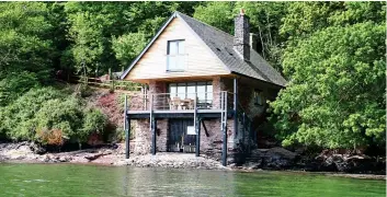  ??  ?? GRAND GETAWAY: The Triumphal Arch on the Holkham estate in Norfolk, left. Above: The Sandridge Boat House in Devon. Below: New York in Llandovery has a mezzanine bedroom