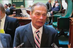  ?? Joseph B. Nadeau photos ?? LEFT: Ruggerio, a North Providence Democrat and former Senate majority leader, meets the press after the vote.